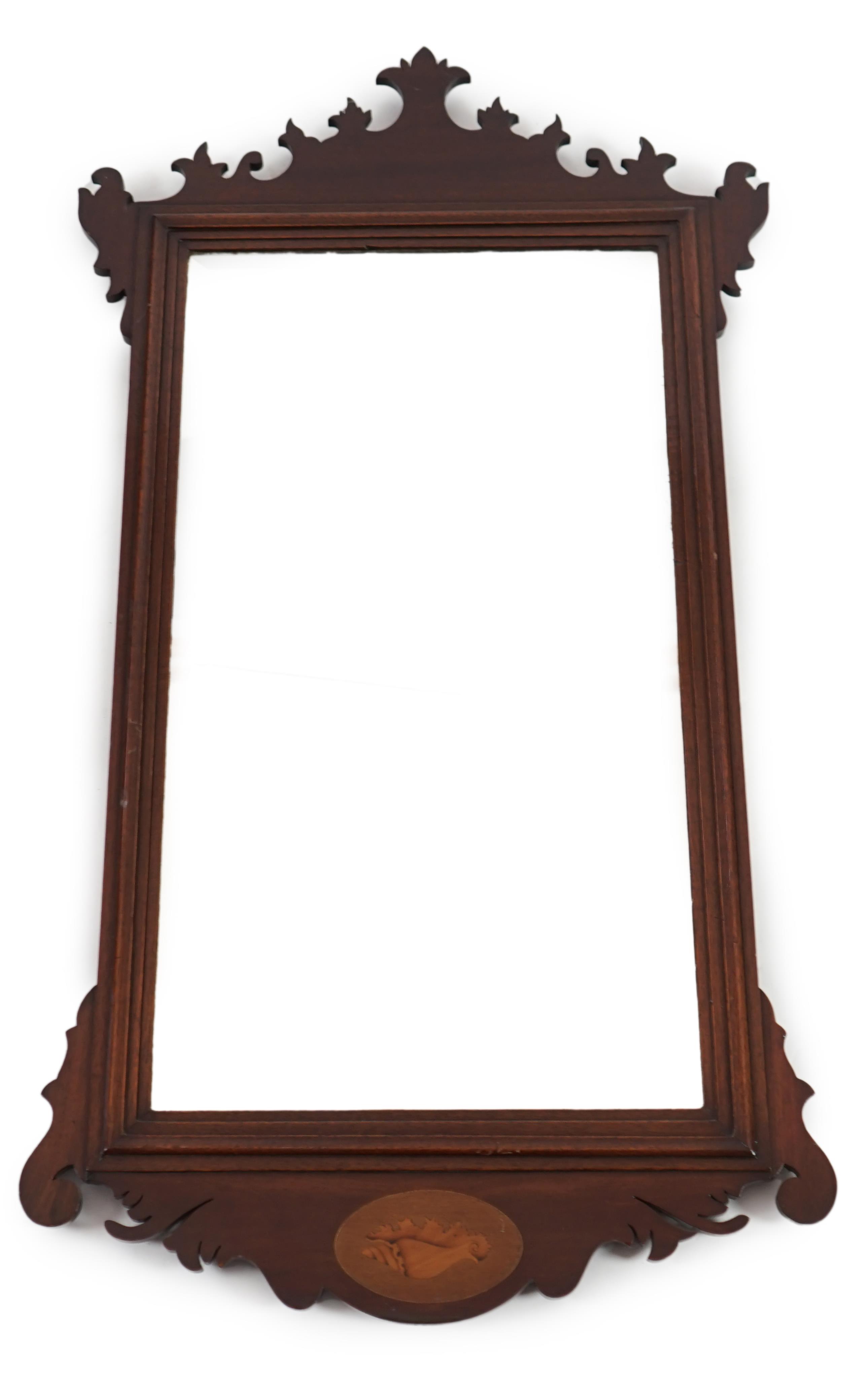 A Georgian style mahogany fret frame wall mirror